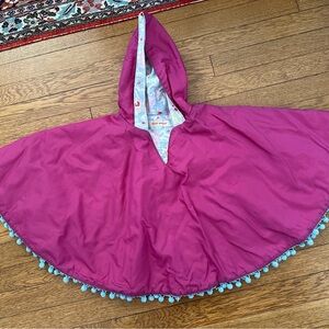 Adorable rain poncho - one size good for size 5-6 perfect condition